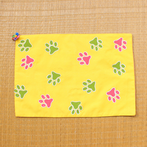 paws table mat yellow