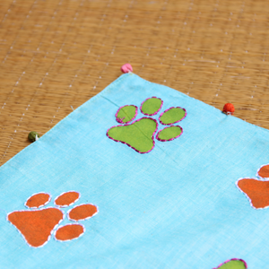 paws table mat blue